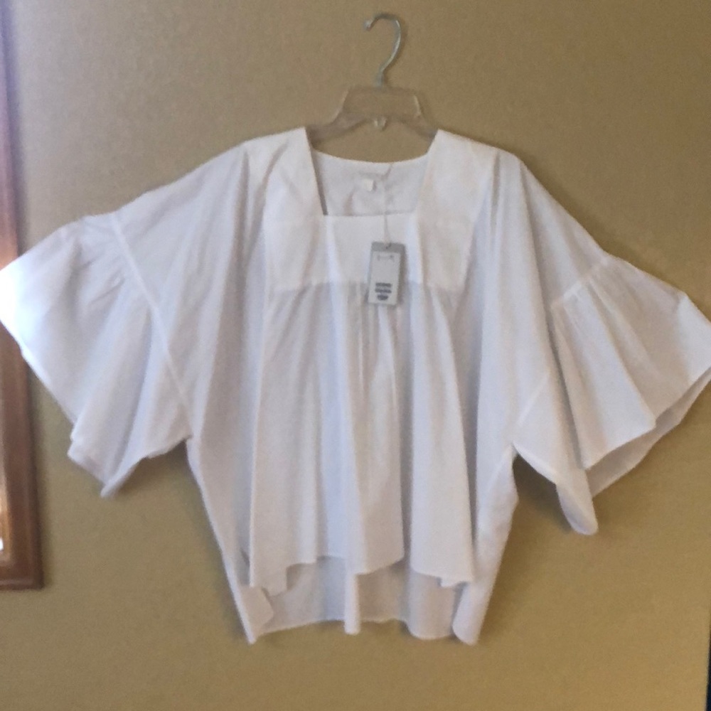 Peasant looking blouse. Loose and comfortable.